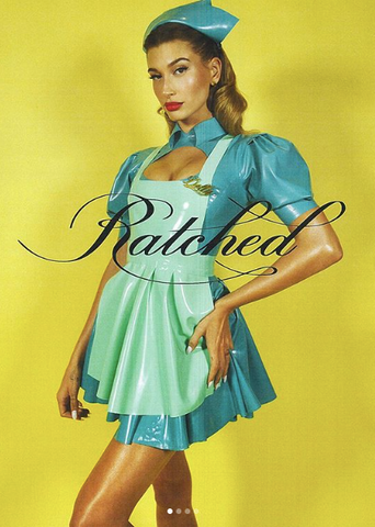 Hailey Bieber in a mint latex nurse dress by Vex Clothing, dressed as Nurse Dolly from Ratched
