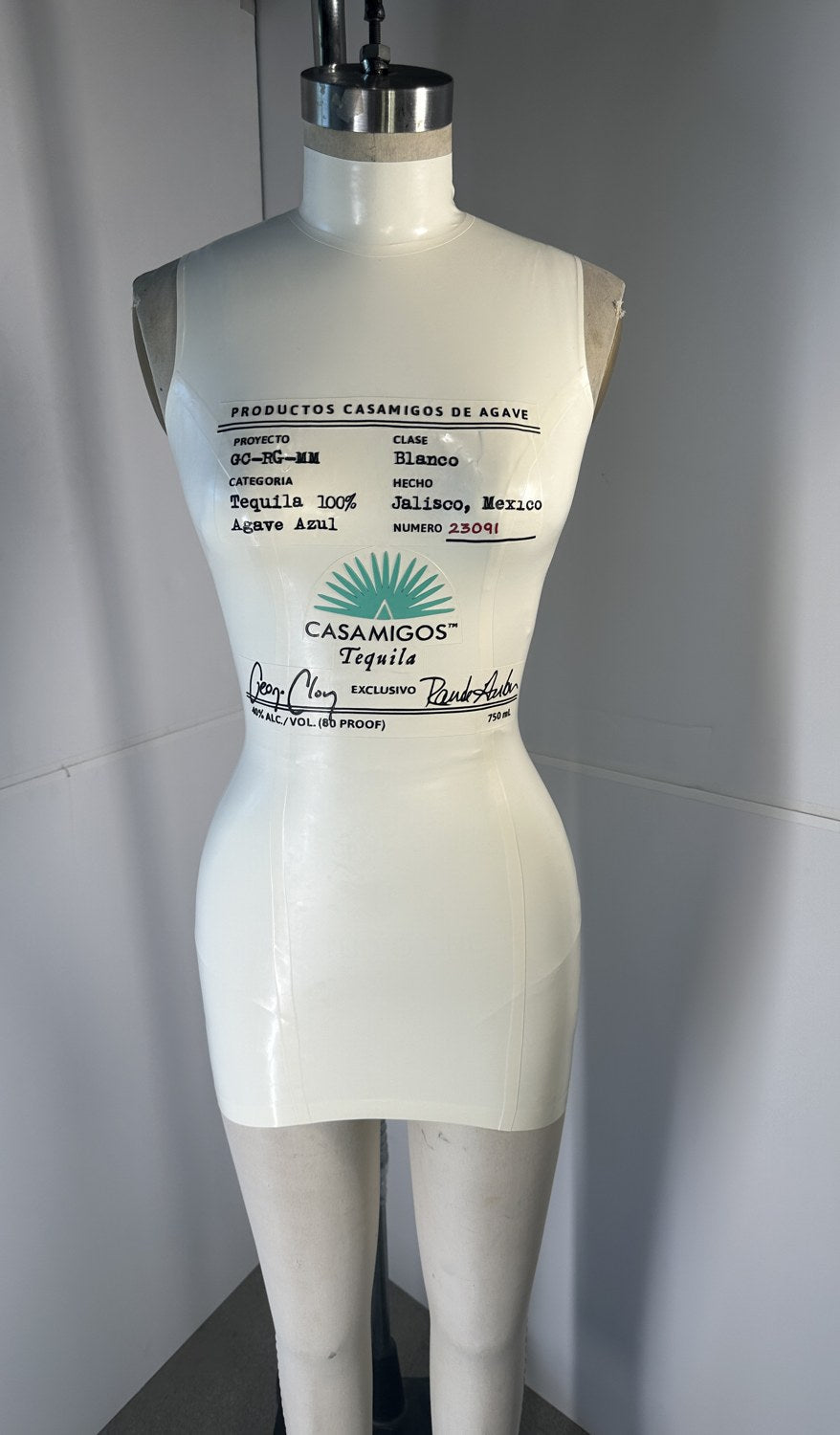 White latex mini dress printed as a Casamigos Blanco tequila bottle by Vex