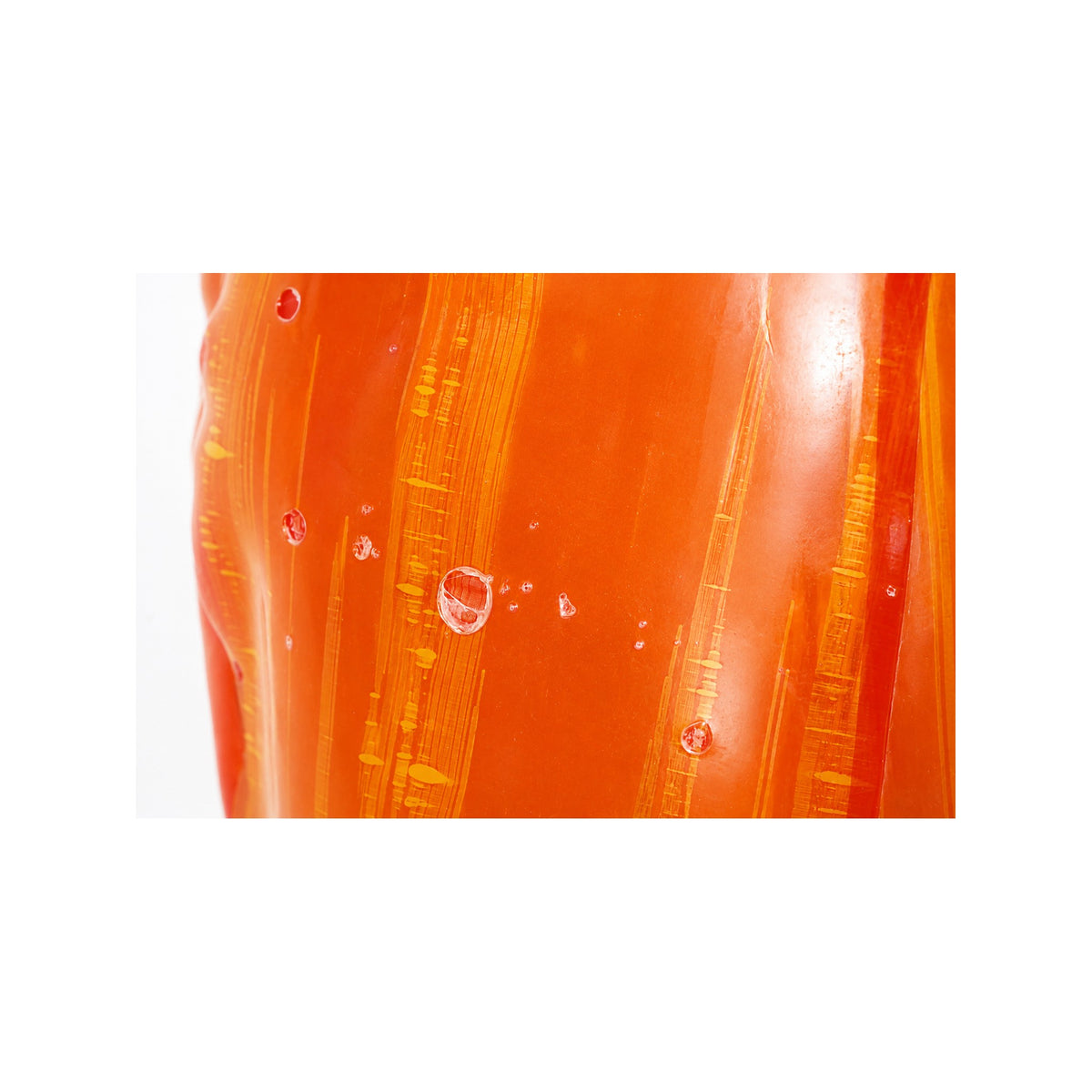 Detail of raw transparent nylon latex showing natural inclusions and streaking — Vex Clothing