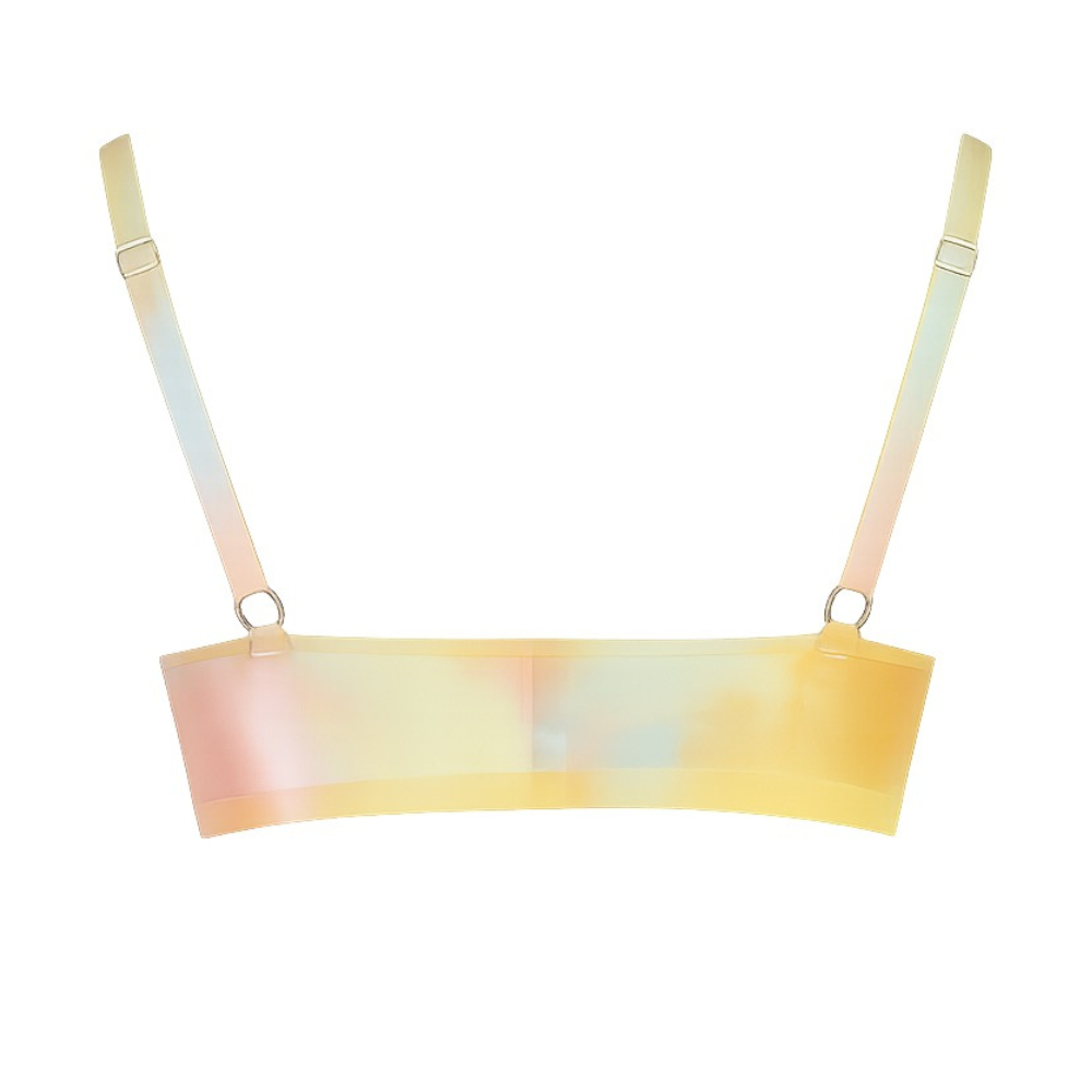 A Vex Clothing, INC pastel bralette with adjustable straps and a seamless back, shown against a white background. The fabric displays a dreamy marble print in soft yellow, pink, and light blue gradients.
