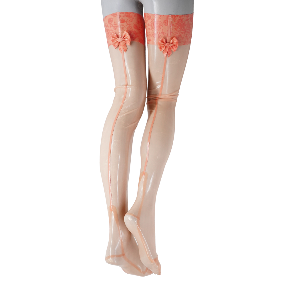 A mannequin’s legs in sheer, glossy Vex Latex stockings with coral lace tops, bows at the back, and a seam down each leg—perfect as a striking Ready to Ship Banner collection header.
