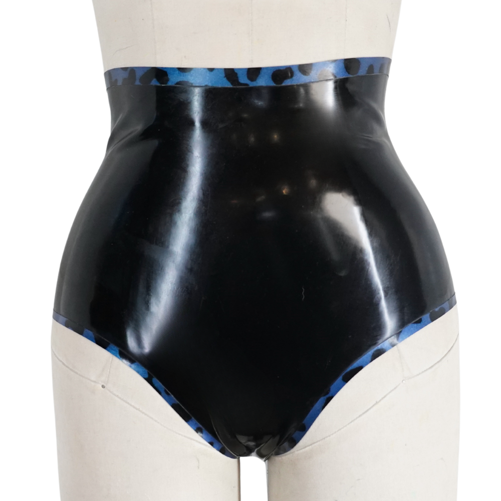 A mannequin models Vex Clothing, INC high-waisted shiny black latex underwear featuring blue and black leopard print trim on the waistband and leg openings. Ready to ship for your collection.