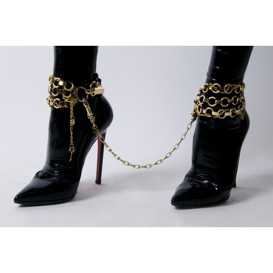 Interlock ankle cuffs worn