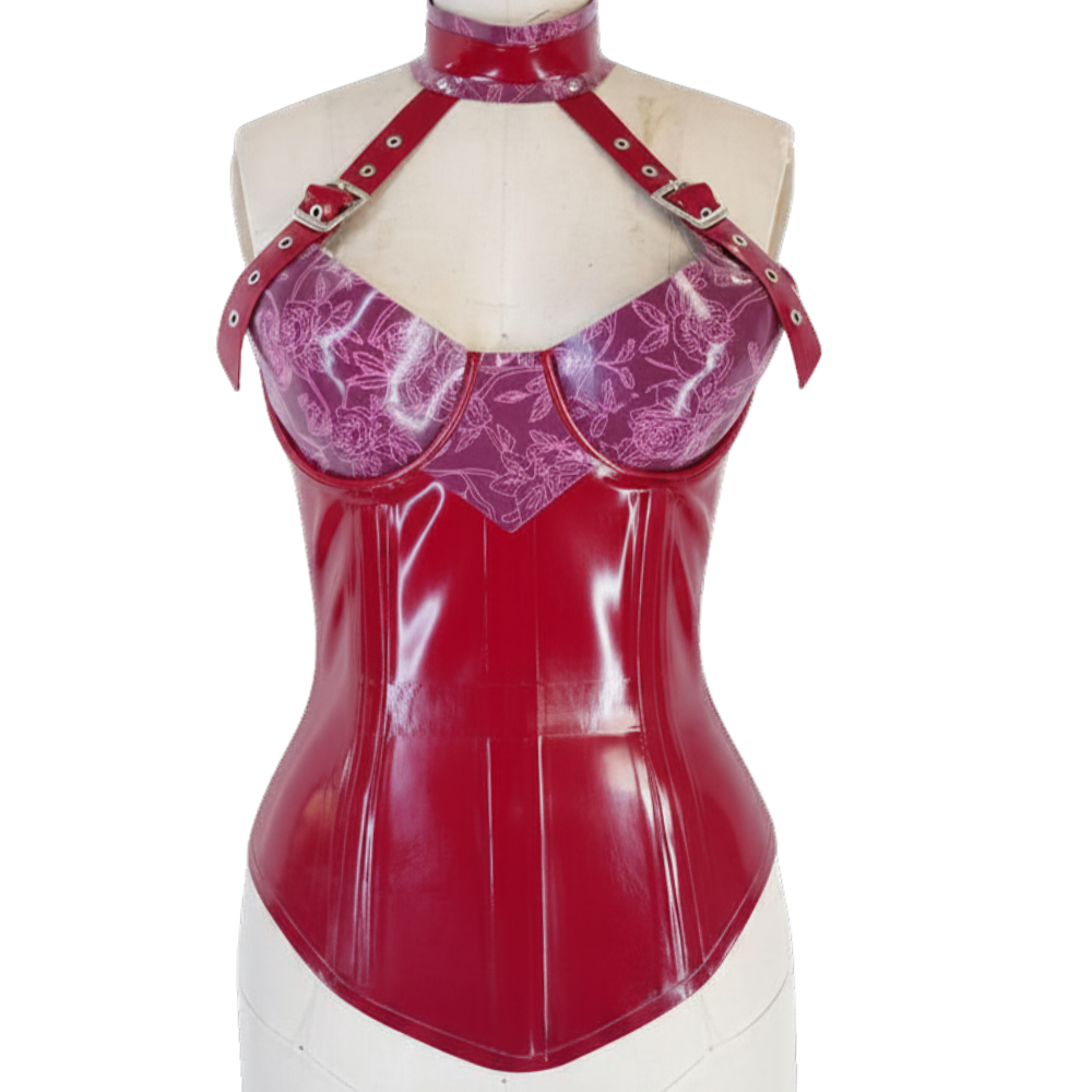 A shiny red corset by Vex Clothing, INC, with floral-patterned bust, buckled shoulder straps, and a bar choker accent is displayed on a dress form. This striking piece is ready to ship.