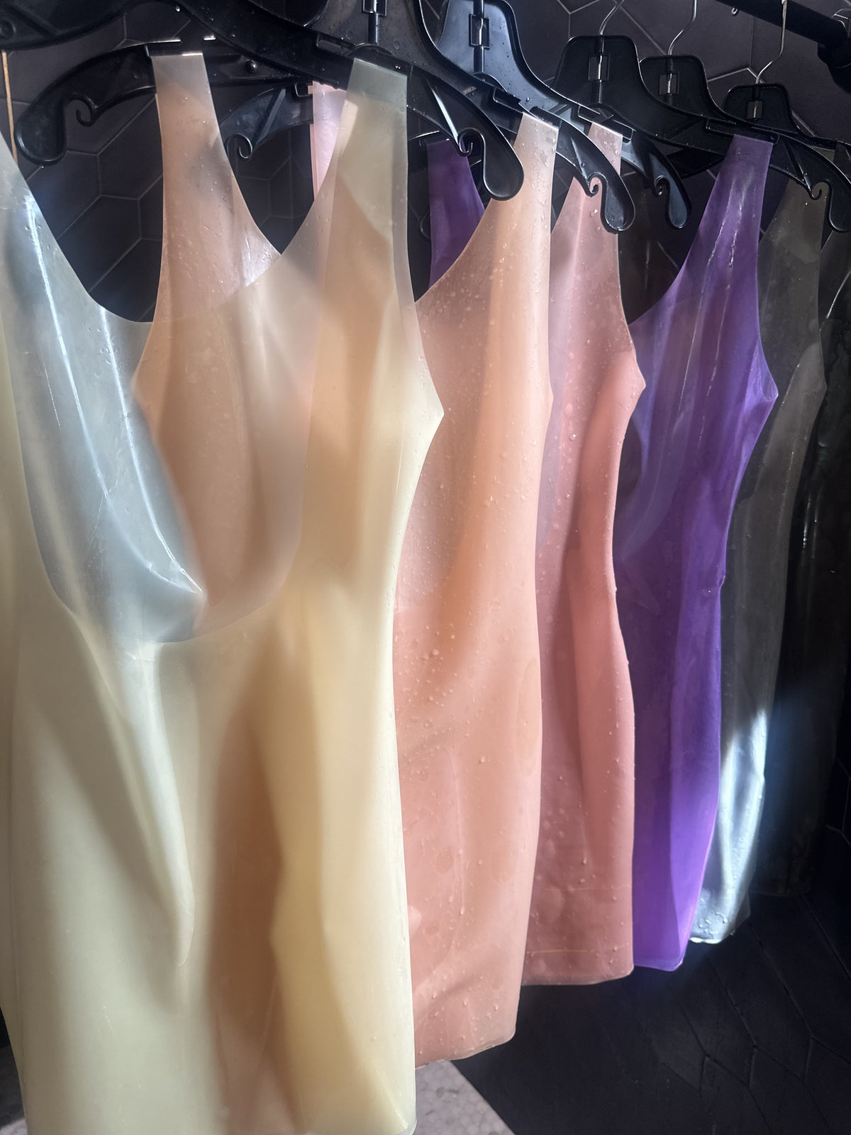 Latex Tank Dress in transparent colour options on the studio rail — Vex Clothing
