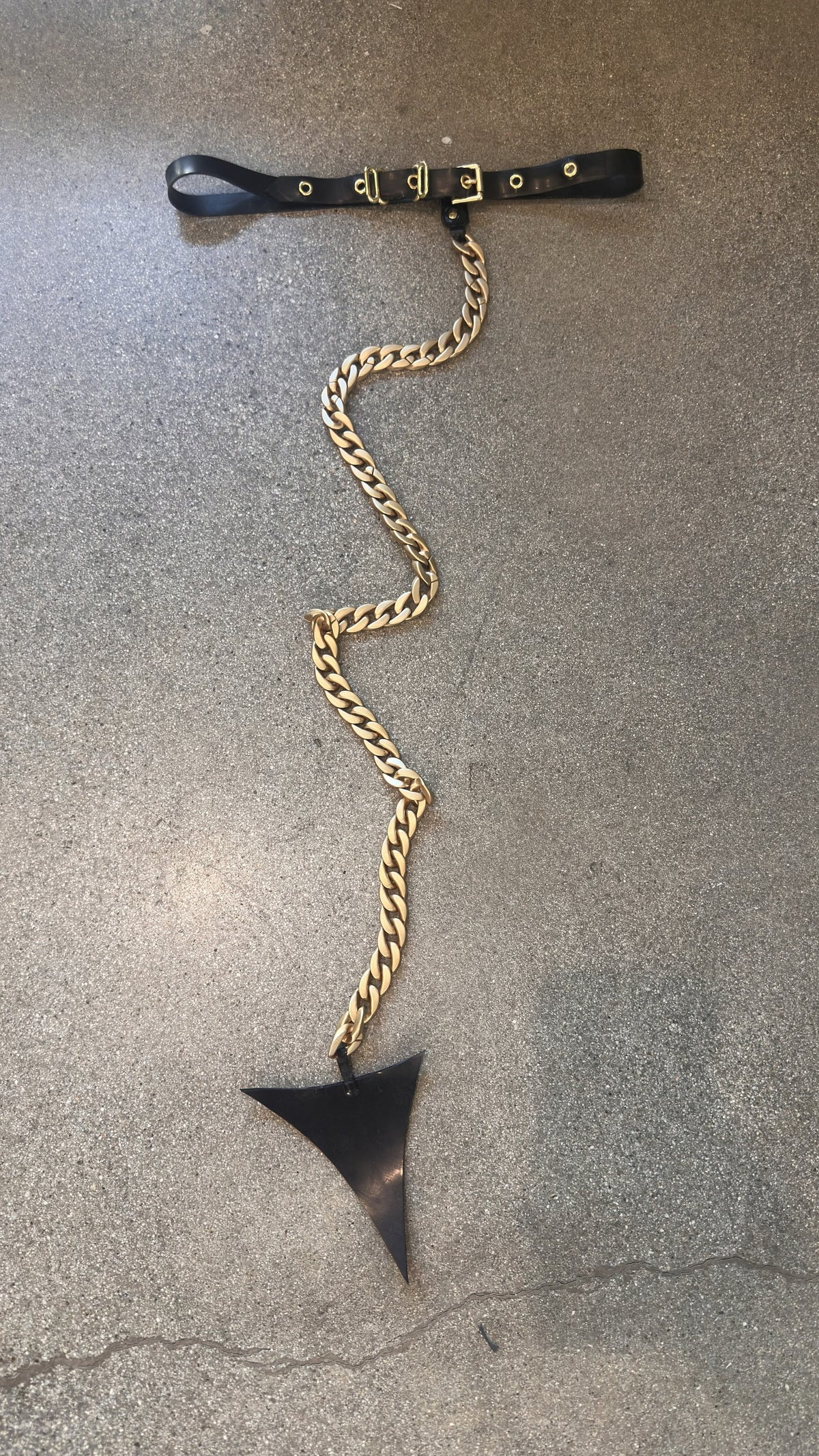 Lucifer Tail — black latex devil tail on gold chain belt by Vex Clothing